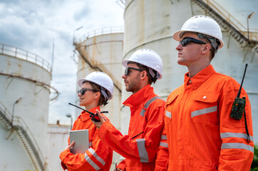 Expertise oil refinery engineer team working in petroleum industrial plant