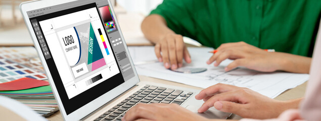 Graphic designer software for modern design of web page and commercial brisk ads showing on the...