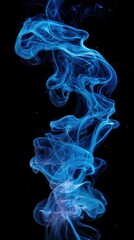 Obraz premium Ethereal Blue Smoke Rising Abstract Photography on Black Background Studio Shot Artistic Composition