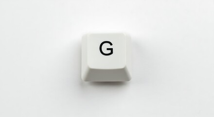 Isolated white 'G' keyboard key on white background