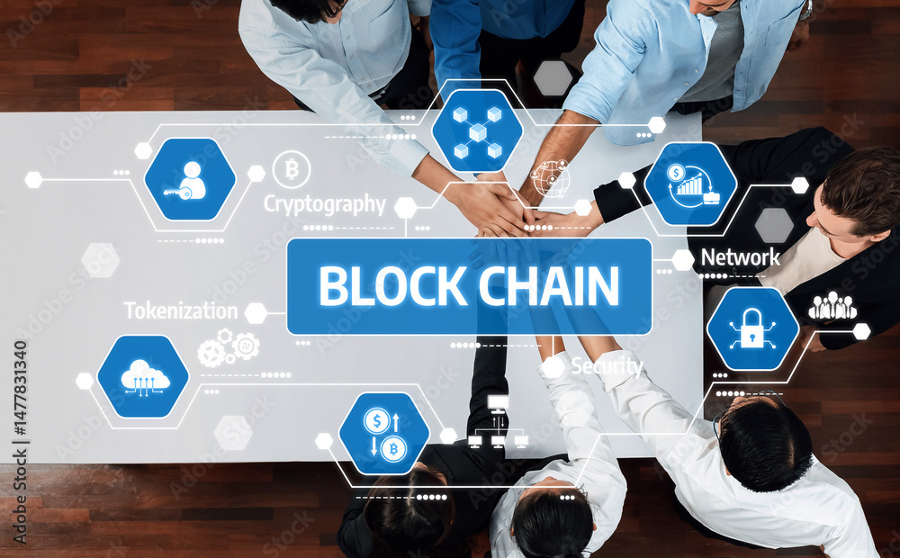 Fototapete A top view of diverse hands coming together over a table showcasing various blockchain-related icons and concepts, emphasizing teamwork and innovation in technology. Amity