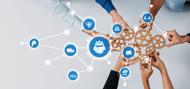 Engaging visual of diverse hands forming interconnected gears, symbolizing teamwork and partnership in a business context, highlighting collaboration and shared goals. Amity