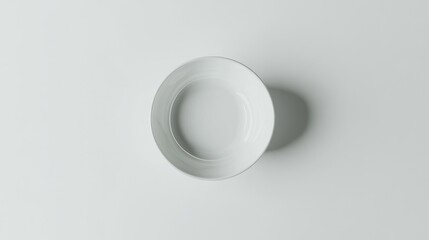 Empty white soup plate on a white background, ready for food.