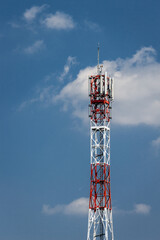Communication tower stands tall under clear blue sky