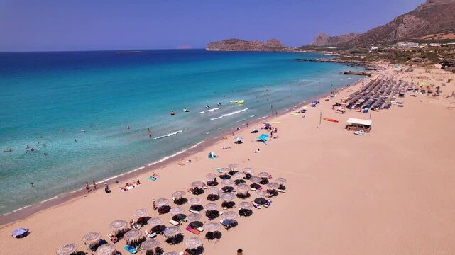Breathtaking aerial view of Cretes sandy beach and turquoise waters on a sunny day