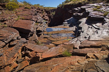 Joffre Creek over Joffre Waterfall in Karijini National Park, Western Australia, Australia
