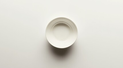 Empty white soup plate on a white background, ready for food.