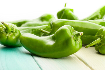 sweet green melrose pepper on wood background