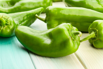 sweet green melrose pepper on wood background