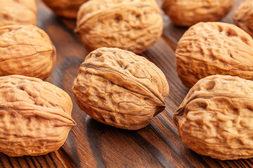 walnuts group on wood background