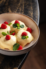 Syrniki with Vanilla Sauce and Raspberries.
Classic cottage cheese pancakes topped with creamy vanilla sauce, fresh raspberries, and mint leaves — a beloved Eastern European dessert.
