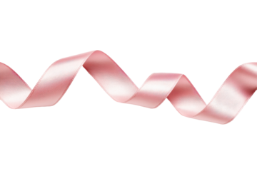 Elegant flowing pink ribbon isolated against black background creating a wave pattern perfect for decoration and design work