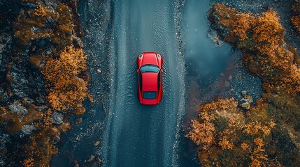 Red car on a mountain road
