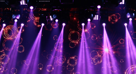 An empty stage of the theater, lit by spotlights and smoke before the performance