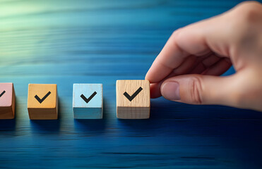 Quality control and certification process concept. A hand places wooden block with checkmark icon in step-by-step symbolizing process of document review, checklist, approval, and quality certificate.
