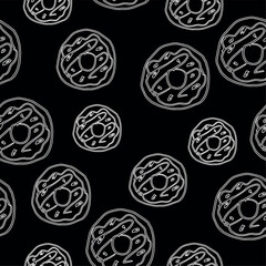 Seamless pattern with donuts, made in a handmade doodle style, on a contrasting black background. Perfect for packaging design, fabrics, cooking projects, clothing prints, backgrounds