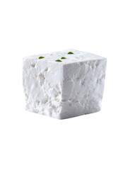 A close-up shot showcases a neatly cubed block of fresh feta cheese adorned with delicate green herb sprigs, set against a pristine white background in studio shot.