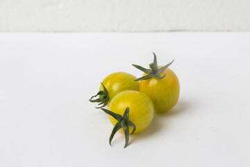 Yellow Cherry Tomatoes on White Background