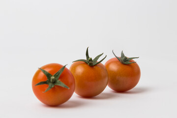 Red Cherry Tomatoes on White Background