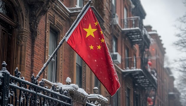 Chinese flag waving in the snow