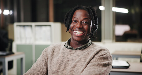 Black man, call center and portrait in office at night for contact us, communication or telecom...