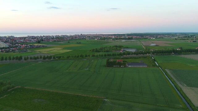 Parallel Sunset Flight Along Road with Tree Line and Fields | FlyLens 4K