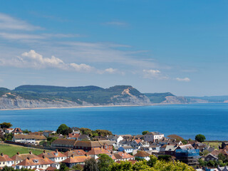 Overview of Lyme Regis buildings across Lyme Bay and the Jurassic coastline