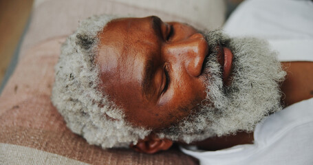 Relax, calm and black man at meditation class for mindfulness, peace and balance practice. Zen, yoga nidra and mature person at somatic healing session for wellness, health or trauma release.