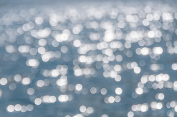 bubbles and sparkles on water with bokeh effect. Blue and white colors. Perfect for textures and designs