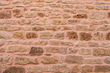 Texture of an old stone wall typical of the south of France