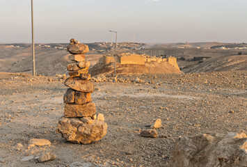 Tourist rock pile in front of crusader castle known as Shonak Castle or Mont Real near Petra in...