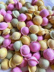 colorful rainbow frozen dumplings, ravioli. food photo