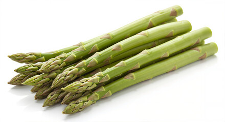 Fresh green asparagus spears stacked on a white background  