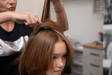 Fototapeta premium Enjoy an exquisite Hair Styling Session at a chic and modern salon with expert beauticians present