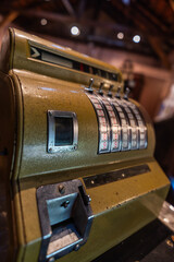 Old cash register with crank and keys