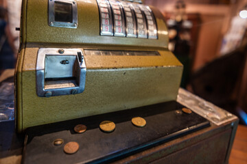 Old cash register with crank and keys