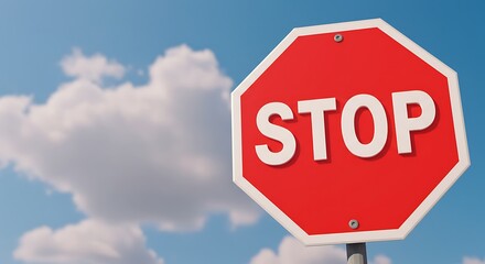 Obraz premium Stop Sign on a Sunny Day Against Blue Sky with Clouds