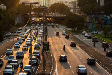 Sao Paulo, SP, Brazil, April 04, 2016. Sunset and heavy traffic on the East-West connection, Radial Leste Avenue, in downtown Sao Paulo.