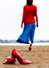 young woman walking on the beach