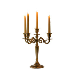A golden candelabra with four lit candles standing on a black background in a studio setting view