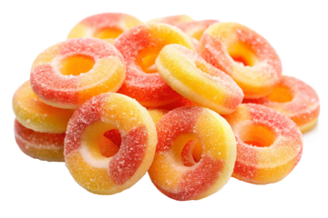 Delicious pile of peach ring candies with sugar coating on a White background.