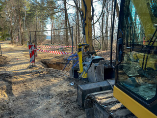 Earth excavation during construction of sewage and water supply network.