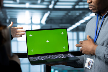 Mockup laptop used by data center computer scientists reviewing equipment diagnostics. Close up of...