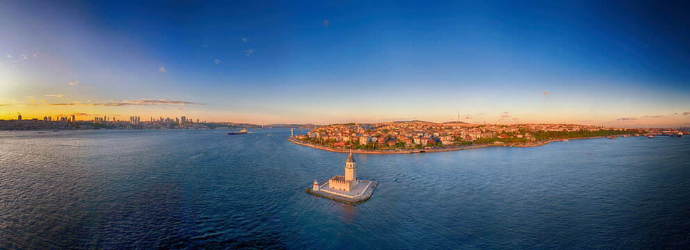 Panoramic view of Istanbul's Maiden's Tower at sunrise. Stunning aerial panorama of istanbul, Turkey, showcasing the Leander's Tower (Kiz Kulesi) at sunrise Turkiye. Bosphorus Uskudar Camlica Salacak 