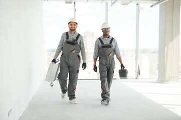 Group of multi ethnic engineer construction site worker meeting at workplace