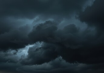 Dark storm clouds implying impending weather and atmospheric pressure, with ominous sky
