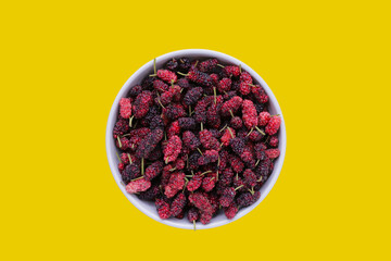 Fresh mulberry on white background.