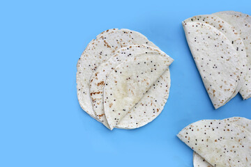 Quinoa tortilla wraps on white background