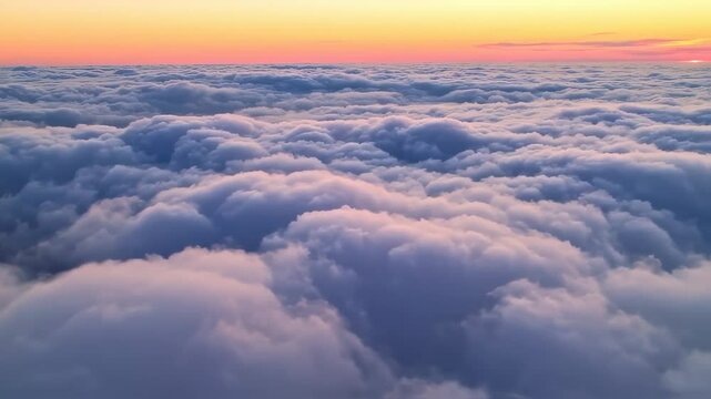 Beautiful flight over clouds at sunset