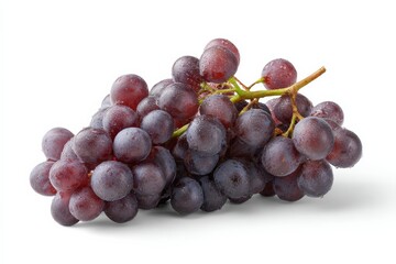 Fototapeta premium A bunch of ripe red grapes glistening with water droplets, isolated on a white background.